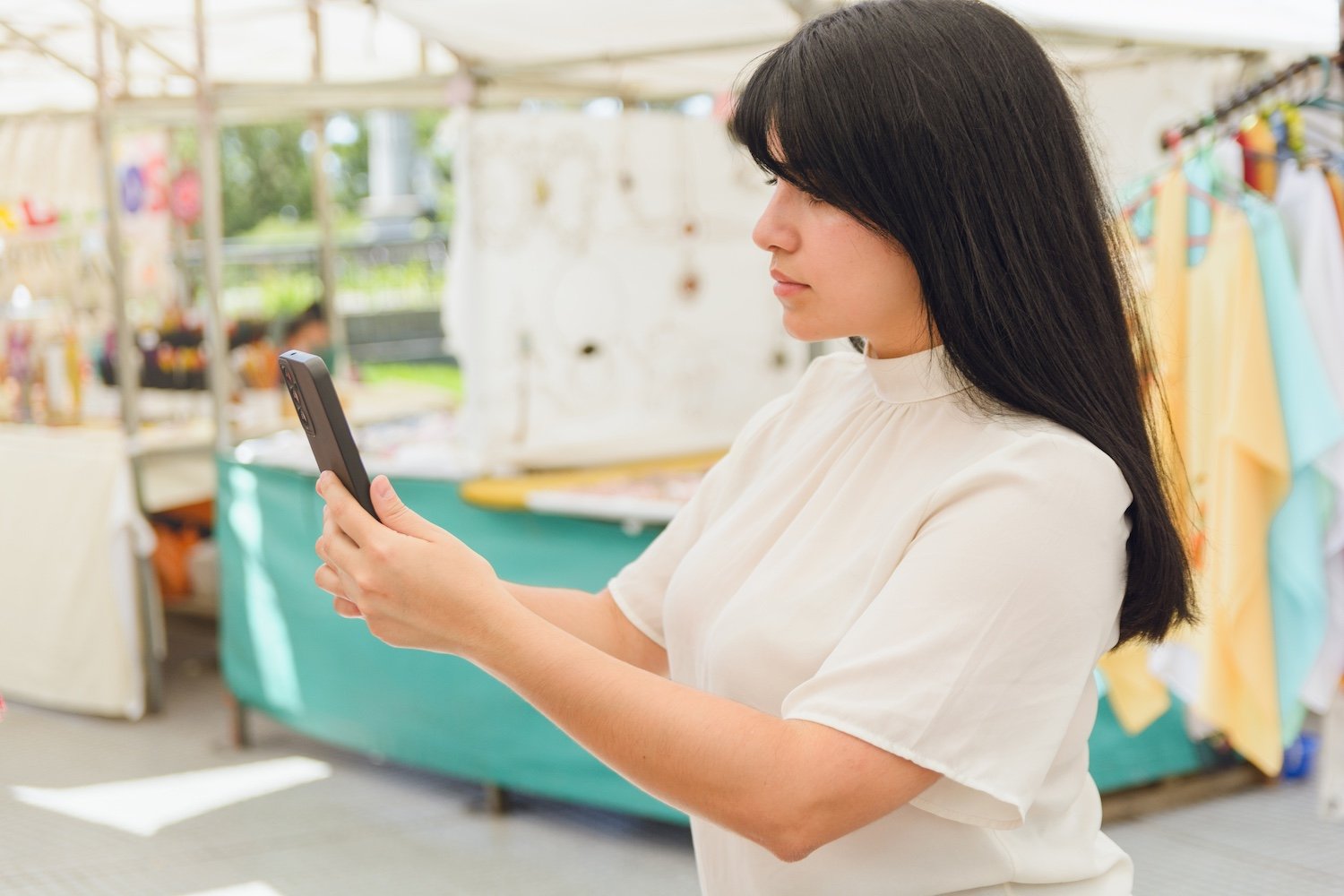young-latin-tourist-woman-standing-at-craft-fair-w-2024-02-08-19-46-13-utc